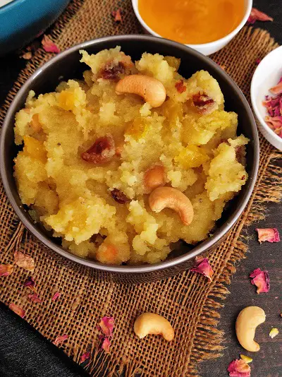 Pineapple Sheera With Pineapple Syrup | Pineapple Kesari | Pineapple Halwa Pineapple Sheera With Pineapple Syrup | Pineapple Kesari | Pineapple Halwa https://thespicycafe.com/wp-content/uploads/2023/03/112-pineapple-sheera-halwa-kesari-godacha-sheera-maharashtrian-goad-sheera-semolina-pudding-vegetarian-easy-quick-simple-no-onion-no-garlic-breakfast-snack-Indian-dessert-sweet-recipe.jpg https://thespicycafe.com/pineapple-sheera-using-pineapple-syrup/