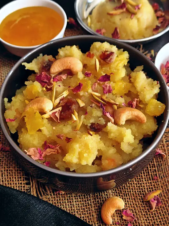 Pineapple Sheera With Pineapple Syrup | Pineapple Kesari | Pineapple Halwa Pineapple Sheera With Pineapple Syrup | Pineapple Kesari | Pineapple Halwa https://thespicycafe.com/wp-content/uploads/2023/03/112-pineapple-sheera-halwa-kesari-godacha-sheera-maharashtrian-goad-sheera-semolina-pudding-vegetarian-easy-quick-simple-no-onion-no-garlic-breakfast-snack-Indian-dessert-sweet-recipe.jpg https://thespicycafe.com/pineapple-sheera-using-pineapple-syrup/