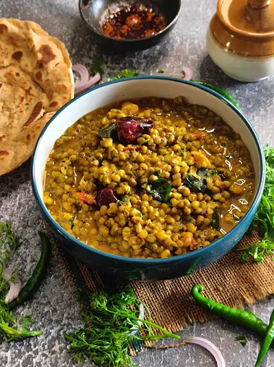 Hirvya Mugachi Usal | Green Moong Dal Curry | Green Gram Curry Hirvya Mugachi Usal | Green Moong Dal Curry | Green Gram Curry https://thespicycafe.com/wp-content/uploads/2023/05/140-green-moong-dal-curry-mung-beans-green-gram-hirvya-mugachi-usal-vegan-vegetarian-keto-protein-diabetic-friendly-simple-quick-easy-healthy-nutritious-lunch-dinner-indian-meal.jpg https://thespicycafe.com/green-moong-dal-curry/