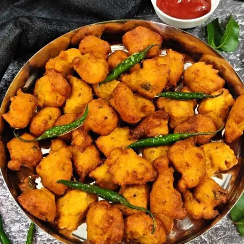 Moong Dal Pakoda | Moong Dal Vada | Moong Dal Bhajiya Recipe Moong Dal Pakoda | Moong Dal Vada | Moong Dal Bhajiya Recipe https://thespicycafe.com/wp-content/uploads/2023/07/11-1-moong-dal-pakoda-monsoon-snack-moong-bhajiya-moong-bhajji-bhajee-yellow-mung-bean-fritters-vegan-vegetarian-protein-rich-easy-quick-simple-breakfast-lunch-dinner.png https://thespicycafe.com/moong-dal-pakoda-recipe/