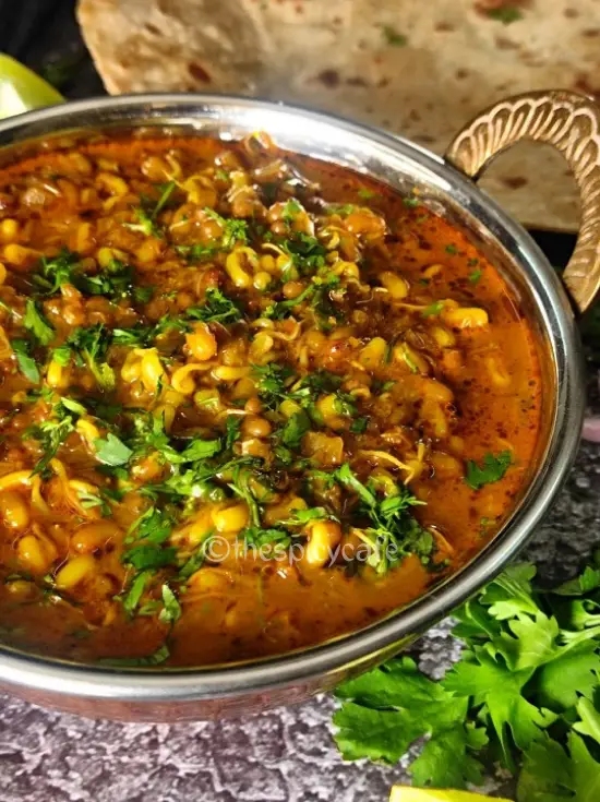 Matki Usal Recipe | मटकीची उसळ | Moth Beans Curry Matki Usal Recipe | मटकीची उसळ | Moth Beans Curry https://thespicycafe.com/wp-content/uploads/2023/12/1-matki-usal-matki-dal-moth-beans-curry-vegan-vegetarian-high-protein-easy-quick-simple-lunch-dinner-misal-pav-Maharashtrian-Indian-legume-healthy-nutritious-weightloss.png https://thespicycafe.com/matki-usal-recipe/