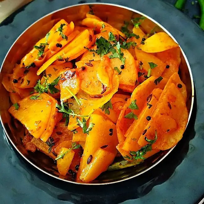 Batatyachya Kachrya - Maharashtrian Spicy Sliced Potato Fry (No Onion No Garlic Recipe) https://thespicycafe.com/wp-content/uploads/2021/04/IMG_15042021_104946_650_x_650_pixel.jpg https://thespicycafe.com/tag/vegan/