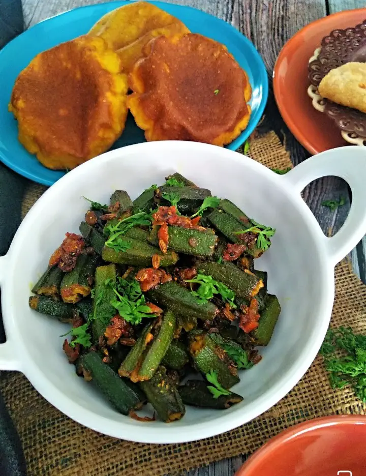 Bhindi Masala - Vegan Okra Masala https://thespicycafe.com/wp-content/uploads/2021/08/bhendi-masala.jpg https://thespicycafe.com/tag/vegan-vegetable/