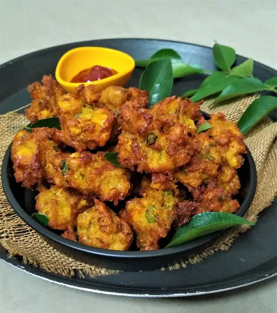 Sweet Corn Pakoda | Corn Bhajiya | Makai Bhajiya Sweet Corn Pakoda | Corn Bhajiya | Makai Bhajiya https://thespicycafe.com/wp-content/uploads/2021/12/makai-ke-pakode-vegan-vegetarian-indian-snacks-glutenfree-sweet-corn-pakoda-fritters.jpg https://thespicycafe.com/sweet-corn-pakoda-corn-bhajiya-makai-bhajiya-recipe/