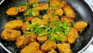 Dudhi Muthiya | Lauki Muthiya Recipe | Steamed Bottle Gourd Dumplings Dudhi Muthiya | Lauki Muthiya Recipe | Steamed Bottle Gourd Dumplings https://thespicycafe.com/wp-content/uploads/2022/07/dudhi-muthiya-lauki-muthiya-popular-gujarati-indian-snack-recipe.jpg https://thespicycafe.com/dudhi-muthiya/