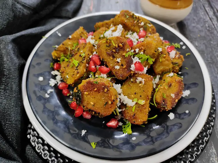 Dudhi Muthiya | Lauki Muthiya Recipe | Steamed Bottle Gourd Dumplings Dudhi Muthiya | Lauki Muthiya Recipe | Steamed Bottle Gourd Dumplings https://thespicycafe.com/wp-content/uploads/2022/07/dudhi-muthiya-lauki-muthiya-popular-gujarati-indian-snack-recipe.jpg https://thespicycafe.com/dudhi-muthiya/
