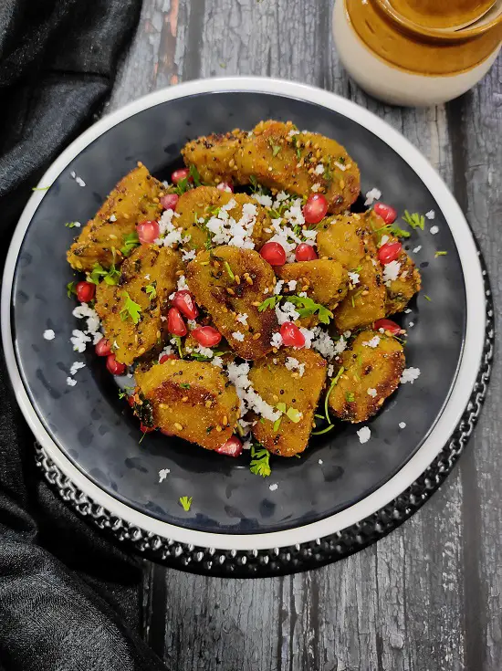 Dudhi Muthiya | Lauki Muthiya Recipe | Steamed Bottle Gourd Dumplings Dudhi Muthiya | Lauki Muthiya Recipe | Steamed Bottle Gourd Dumplings https://thespicycafe.com/wp-content/uploads/2022/07/dudhi-muthiya-lauki-muthiya-popular-gujarati-indian-snack-recipe.jpg https://thespicycafe.com/dudhi-muthiya/