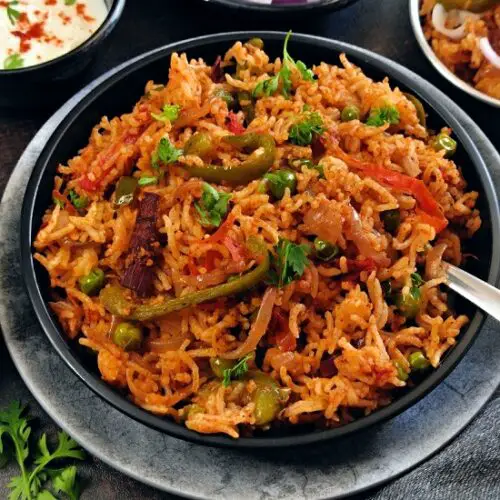 Tawa Pulao Recipe (Mumbai Street Style) Tawa Pulao Recipe (Mumbai Street Style) https://thespicycafe.com/wp-content/uploads/2023/01/1-tawa-pulao-street-style-mumbai-street-food-style-pav-bhaji-pulao-pulav-rice-vegan-vegetarian-gluten-free-indian-recipe.jpg https://thespicycafe.com/tawa-pulao-street-style-recipe/