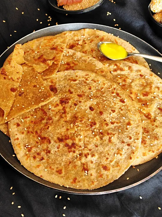 Gul Poli | Gud Poli | Til Gul Poli -Maharashtrian Recipe https://thespicycafe.com/wp-content/uploads/2023/01/GUL-POLI-MAHARASHTRIAN-TIL-GUL-POLI-GUD-POLI.jpg https://thespicycafe.com/category/dessert-recipes/