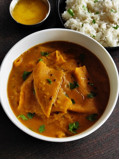 Varanfal / Chakolya - Dal Dhokli Recipe Varanfal / Chakolya - Dal Dhokli Recipe https://thespicycafe.com/wp-content/uploads/2023/01/traditional-gujarati-dal-dhokli-recipe-authentic-maharashtrian-varanfal-recipe-vegan-vegetarian.jpg https://thespicycafe.com/daldhokli-varanfal-recipe/