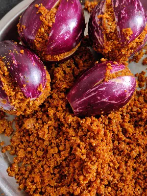 Bharli Vangi Maharashtrian Style | Stuffed Eggplant Curry Indian Recipe Bharli Vangi Maharashtrian Style | Stuffed Eggplant Curry Indian Recipe https://thespicycafe.com/wp-content/uploads/2023/08/1-bharli-vangi-bharwa-baingan-stuffed-eggplants-aubergine-peanut-curry-vegan-vegetarian-easy-quick-simple-brinjal-curry-lunch-dinner-gravy-indian-maharashtrian-vangi.png https://thespicycafe.com/bharli-vangi/