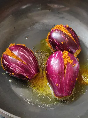 Bharli Vangi Maharashtrian Style | Stuffed Eggplant Curry Indian Recipe Bharli Vangi Maharashtrian Style | Stuffed Eggplant Curry Indian Recipe https://thespicycafe.com/wp-content/uploads/2023/08/1-bharli-vangi-bharwa-baingan-stuffed-eggplants-aubergine-peanut-curry-vegan-vegetarian-easy-quick-simple-brinjal-curry-lunch-dinner-gravy-indian-maharashtrian-vangi.png https://thespicycafe.com/bharli-vangi/