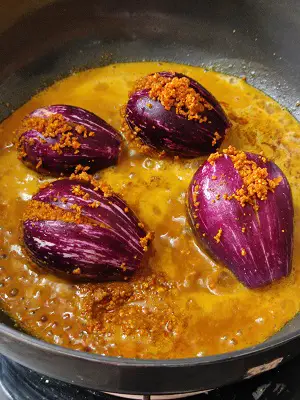 Bharli Vangi Maharashtrian Style | Stuffed Eggplant Curry Indian Recipe Bharli Vangi Maharashtrian Style | Stuffed Eggplant Curry Indian Recipe https://thespicycafe.com/wp-content/uploads/2023/08/1-bharli-vangi-bharwa-baingan-stuffed-eggplants-aubergine-peanut-curry-vegan-vegetarian-easy-quick-simple-brinjal-curry-lunch-dinner-gravy-indian-maharashtrian-vangi.png https://thespicycafe.com/bharli-vangi/