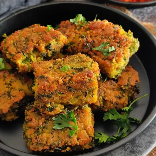 Easy Maharashtrian Kothimbir Vadi Without Steaming Easy Maharashtrian Kothimbir Vadi Without Steaming https://thespicycafe.com/wp-content/uploads/2023/01/kothimbir-vadi-maharashtrian-traditional-vegan-vegetarian-Indian-recipe.jpg https://thespicycafe.com/easy-maharashtrian-kothimbir-vadi-without-steaming/