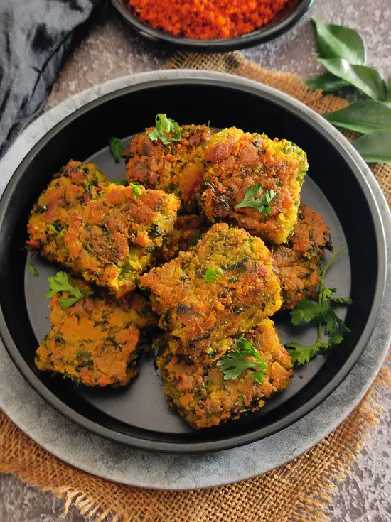 Easy Maharashtrian Kothimbir Vadi Without Steaming Easy Maharashtrian Kothimbir Vadi Without Steaming https://thespicycafe.com/wp-content/uploads/2023/01/kothimbir-vadi-maharashtrian-traditional-vegan-vegetarian-Indian-recipe.jpg https://thespicycafe.com/easy-maharashtrian-kothimbir-vadi-without-steaming/