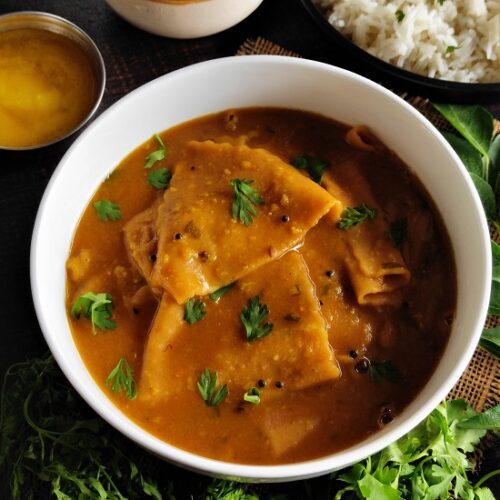 Varanfal / Chakolya - Dal Dhokli Recipe Varanfal / Chakolya - Dal Dhokli Recipe https://thespicycafe.com/wp-content/uploads/2023/01/traditional-gujarati-dal-dhokli-recipe-authentic-maharashtrian-varanfal-recipe-vegan-vegetarian.jpg https://thespicycafe.com/daldhokli-varanfal-recipe/