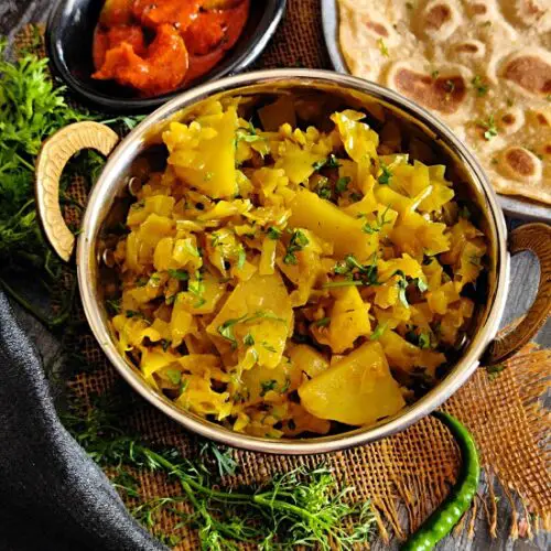 Kobi Batata Bhaji (Cabbage Potato Sabzi) Kobi Batata Bhaji (Cabbage Potato Sabzi) https://thespicycafe.com/wp-content/uploads/2023/03/16-patta-gobi-ki-sabji-cabbage-potato-curry-kobi-chi-bhaji-vegan-vegetarian-easy-lunch-dinner-breakfast-sabzi-indian-recipes-maharashtrian.jpg https://thespicycafe.com/cabbage-potato-recipe/