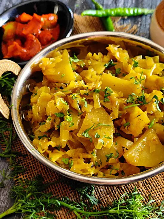 Kobi Batata Bhaji (Cabbage Potato Sabzi) Kobi Batata Bhaji (Cabbage Potato Sabzi) https://thespicycafe.com/wp-content/uploads/2023/03/16-patta-gobi-ki-sabji-cabbage-potato-curry-kobi-chi-bhaji-vegan-vegetarian-easy-lunch-dinner-breakfast-sabzi-indian-recipes-maharashtrian.jpg https://thespicycafe.com/cabbage-potato-recipe/