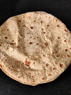 Policha Ladoo | Chapati Ladoo | Roti Ke Ladoo Policha Ladoo | Chapati Ladoo | Roti Ke Ladoo https://thespicycafe.com/wp-content/uploads/2023/03/31-policha-ladoo-maharashtrian-dessert-recipe-easy-quick-simple-vegetarian-leftover-chapati-roti-phulka-healthy-no-onion-no-garlic-kids-snack-recipe-Indian.jpg https://thespicycafe.com/policha-ladoo-recipe/