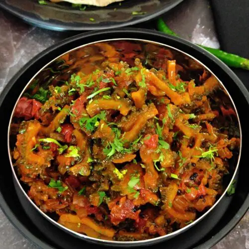 Karlyachi Bhaji | Karela Sabzi |Bitter Gourd Stir Fry Karlyachi Bhaji | Karela Sabzi |Bitter Gourd Stir Fry https://thespicycafe.com/wp-content/uploads/2023/08/1-karla-sabji-karlyachi-bhaji-maharashtrian-karela-sabji-easy-quick-vegan-vegetarian-bitter-gourd-stir-fry-lunch-dinner.png https://thespicycafe.com/karela-sabzi-recipe/