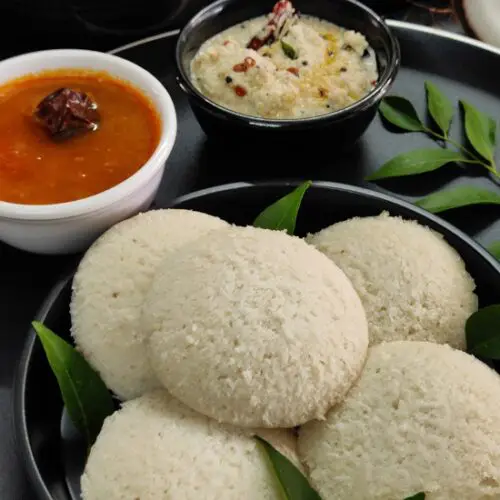 Idli Recipe | How To Make Idli Idli Recipe | How To Make Idli https://thespicycafe.com/wp-content/uploads/2023/08/1-idli-chutney-south-indian-breakafst-recipe-easy-quick-simple-healthy-vegan-vegetarian-popular-street-food-lunch-dinner-sambar-rassam.png https://thespicycafe.com/how-to-make-idli-recipe/