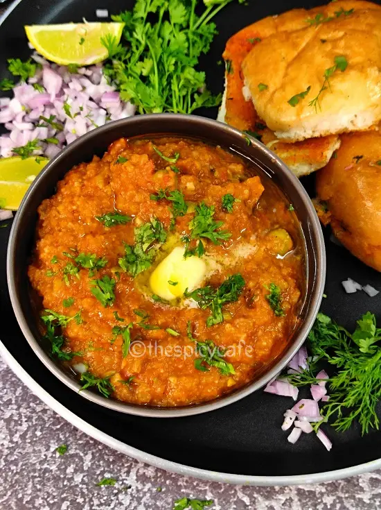Pav Bhaji (Mumbai Street Food) | How To Make Pav Bhaji | Easy Pav Bhaji Recipe https://thespicycafe.com/wp-content/uploads/2023/08/1-Mumbai-pav-bhaji-street-style-popular-vegetarian-snack-lunch-dinner-breakfast-easy-quick-simple-tasty-delicious-1.png https://thespicycafe.com/category/indian-snacks/