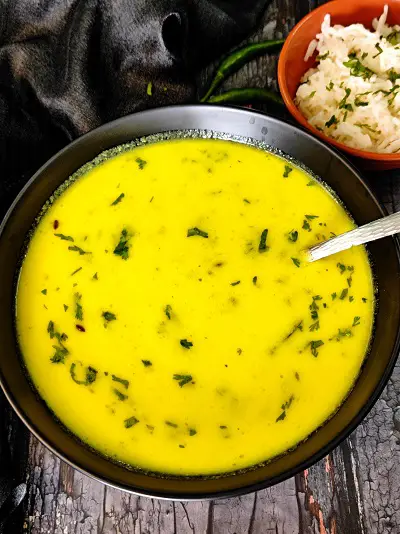Maharashtrian Kadhi Recipe | Sweet & Tangy Kadhi Recipe | Yogurt Curry Maharashtrian Kadhi Recipe | Sweet & Tangy Kadhi Recipe | Yogurt Curry https://thespicycafe.com/wp-content/uploads/2023/08/1-Maharashtrian-kadhi-recipe-vegetarian-proteinrich-curd-yogurt-curry-sweet-tangy-spicy-easy-quick-simple-lunch-dinner-soup-bowl-Indian-curry-kadhi-pakoda.png https://thespicycafe.com/maharashtrian-kadhi-recipe/
