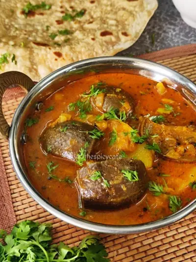 Aloo Baingan Recipe | Aloo Baingan Ki Sabji | Easy Eggplant Potato Curry Aloo Baingan Recipe | Aloo Baingan Ki Sabji | Easy Eggplant Potato Curry https://thespicycafe.com/wp-content/uploads/2023/08/1-aloo-baingan-sabji-vangi-batata-rassa-eggplant-potato-curry-vegan-vegetarian-easy-quick-simple-fiber-rich-easy-meals-lunch-dinner-vegetables-healthy-nutritious.png https://thespicycafe.com/aloo-baingan-sabji-eggplant-curry/