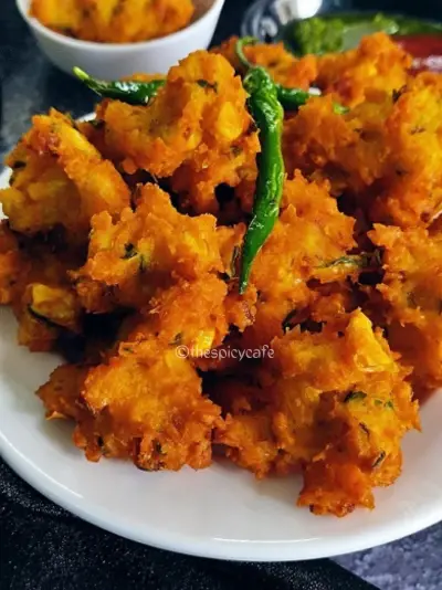Corn Pakoda Recipe | Makai Bhajiya | Sweet Corn Fritters Corn Pakoda Recipe | Makai Bhajiya | Sweet Corn Fritters https://thespicycafe.com/wp-content/uploads/2023/08/2-sweet-corn-pakoda-crispy-corn-fritters-makai-bhajiya-vegan-vegetarian-Indian-street-food-snack-breakfast-lunch-dinner-easy-quick-simple-1.png https://thespicycafe.com/corn-pakoda-recipe/