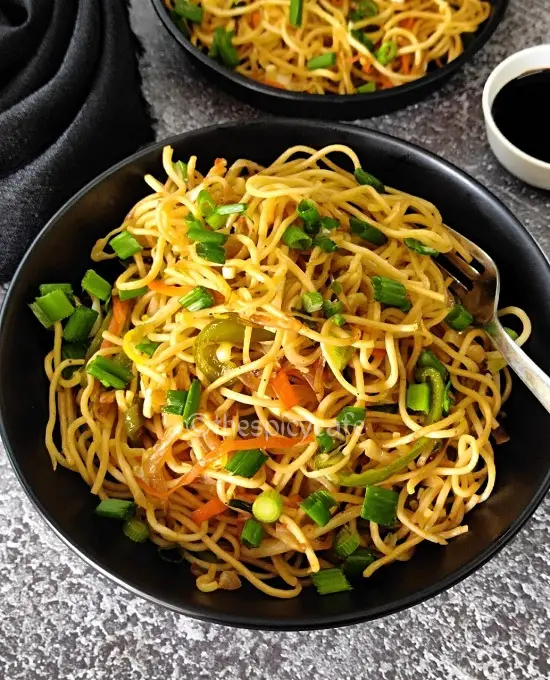 Hakka Noodles Recipe | Vegetable Hakka Noodles | व्हेज हक्का नूडल्स Hakka Noodles Recipe | Vegetable Hakka Noodles | व्हेज हक्का नूडल्स https://thespicycafe.com/wp-content/uploads/2023/10/1-hakka-noodles-vegetable-chinese-noodles-street-food-snack-Indo-Chinese-easy-quick-simple-lunch-dinner-brunch-vegan-vegetarian-thespicycafe.png https://thespicycafe.com/chinese-vegetable-hakka-noodles/