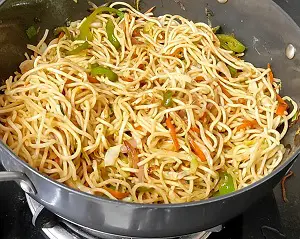 Hakka Noodles Recipe | Vegetable Hakka Noodles | व्हेज हक्का नूडल्स Hakka Noodles Recipe | Vegetable Hakka Noodles | व्हेज हक्का नूडल्स https://thespicycafe.com/wp-content/uploads/2023/10/1-hakka-noodles-vegetable-chinese-noodles-street-food-snack-Indo-Chinese-easy-quick-simple-lunch-dinner-brunch-vegan-vegetarian-thespicycafe.png https://thespicycafe.com/chinese-vegetable-hakka-noodles/