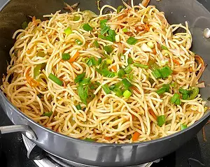 Hakka Noodles Recipe | Vegetable Hakka Noodles | व्हेज हक्का नूडल्स Hakka Noodles Recipe | Vegetable Hakka Noodles | व्हेज हक्का नूडल्स https://thespicycafe.com/wp-content/uploads/2023/10/1-hakka-noodles-vegetable-chinese-noodles-street-food-snack-Indo-Chinese-easy-quick-simple-lunch-dinner-brunch-vegan-vegetarian-thespicycafe.png https://thespicycafe.com/chinese-vegetable-hakka-noodles/