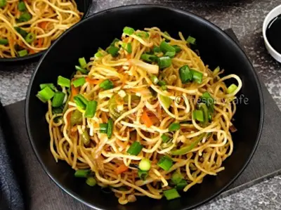 Hakka Noodles Recipe | Vegetable Hakka Noodles | व्हेज हक्का नूडल्स Hakka Noodles Recipe | Vegetable Hakka Noodles | व्हेज हक्का नूडल्स https://thespicycafe.com/wp-content/uploads/2023/10/1-hakka-noodles-vegetable-chinese-noodles-street-food-snack-Indo-Chinese-easy-quick-simple-lunch-dinner-brunch-vegan-vegetarian-thespicycafe.png https://thespicycafe.com/chinese-vegetable-hakka-noodles/