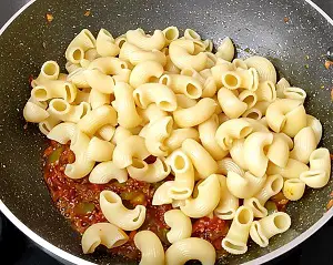 Masala Macaroni Pasta Indian Style (Desi Pasta) Masala Macaroni Pasta Indian Style (Desi Pasta) https://thespicycafe.com/wp-content/uploads/2023/11/2-masala-macaroni-pasta-Indian-style-desi-quick-easy-simple-vegetarian-breakfast-snacks-lunch-dinner-one-pot-instant-pot-kids-party-appetizer.png https://thespicycafe.com/masala-macaroni-pasta-indian-style/