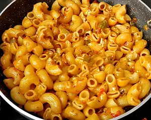Masala Macaroni Pasta Indian Style (Desi Pasta) Masala Macaroni Pasta Indian Style (Desi Pasta) https://thespicycafe.com/wp-content/uploads/2023/11/2-masala-macaroni-pasta-Indian-style-desi-quick-easy-simple-vegetarian-breakfast-snacks-lunch-dinner-one-pot-instant-pot-kids-party-appetizer.png https://thespicycafe.com/masala-macaroni-pasta-indian-style/