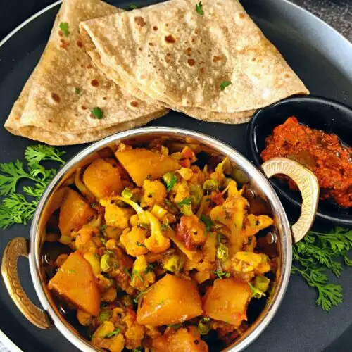 Aloo Gobi Matar Sabji | Cauliflower, Potatoes & Peas Curry Aloo Gobi Matar Sabji | Cauliflower, Potatoes & Peas Curry https://thespicycafe.com/wp-content/uploads/2024/01/1-aloo-gobi-matar-sabji-cauliflower-potatoes-and-peas-curry-easy-quick-simple-lunch-dinner-sunday-meals-vegan-vegetarian-healthy-tiffin-box-lunch-box-Indian-restaurant-style-recipe.png https://thespicycafe.com/aloo-gobi-matar-sabji-recipe/